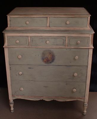 Moss green and peach country-style cabinet-top dresser; 1920s.